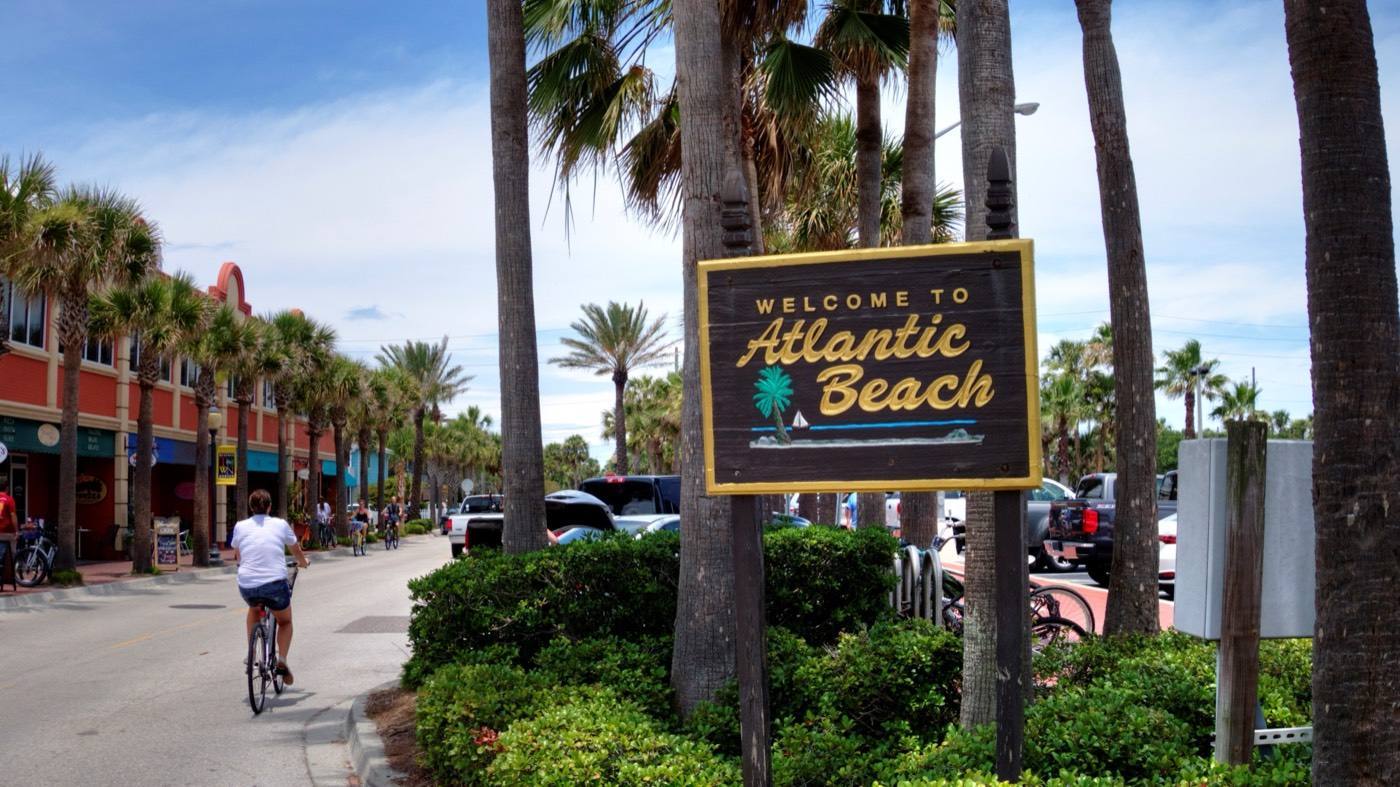 Welcome to Atlantic Beach sign under the palms